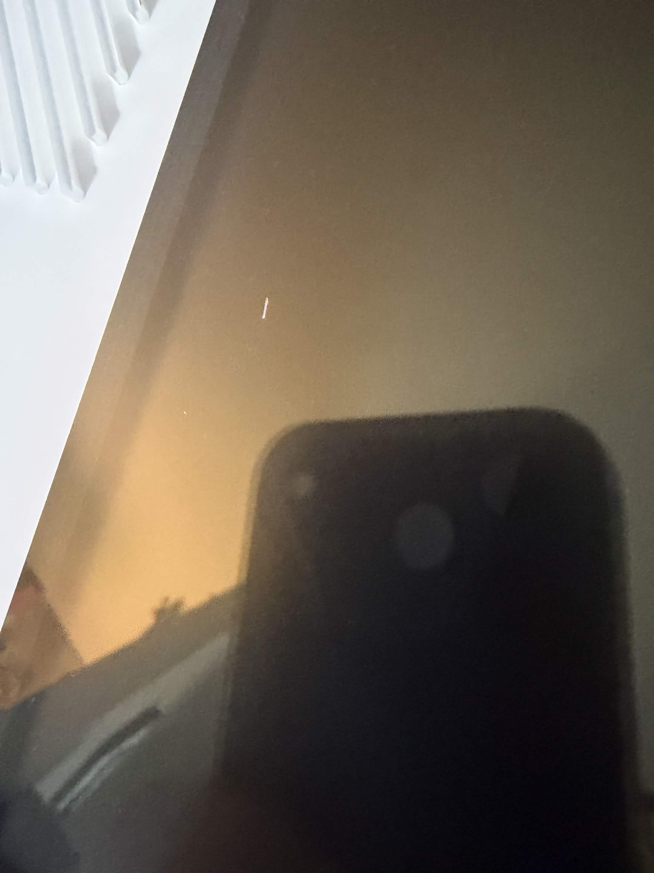 Assembly detail showing orange section with bolts