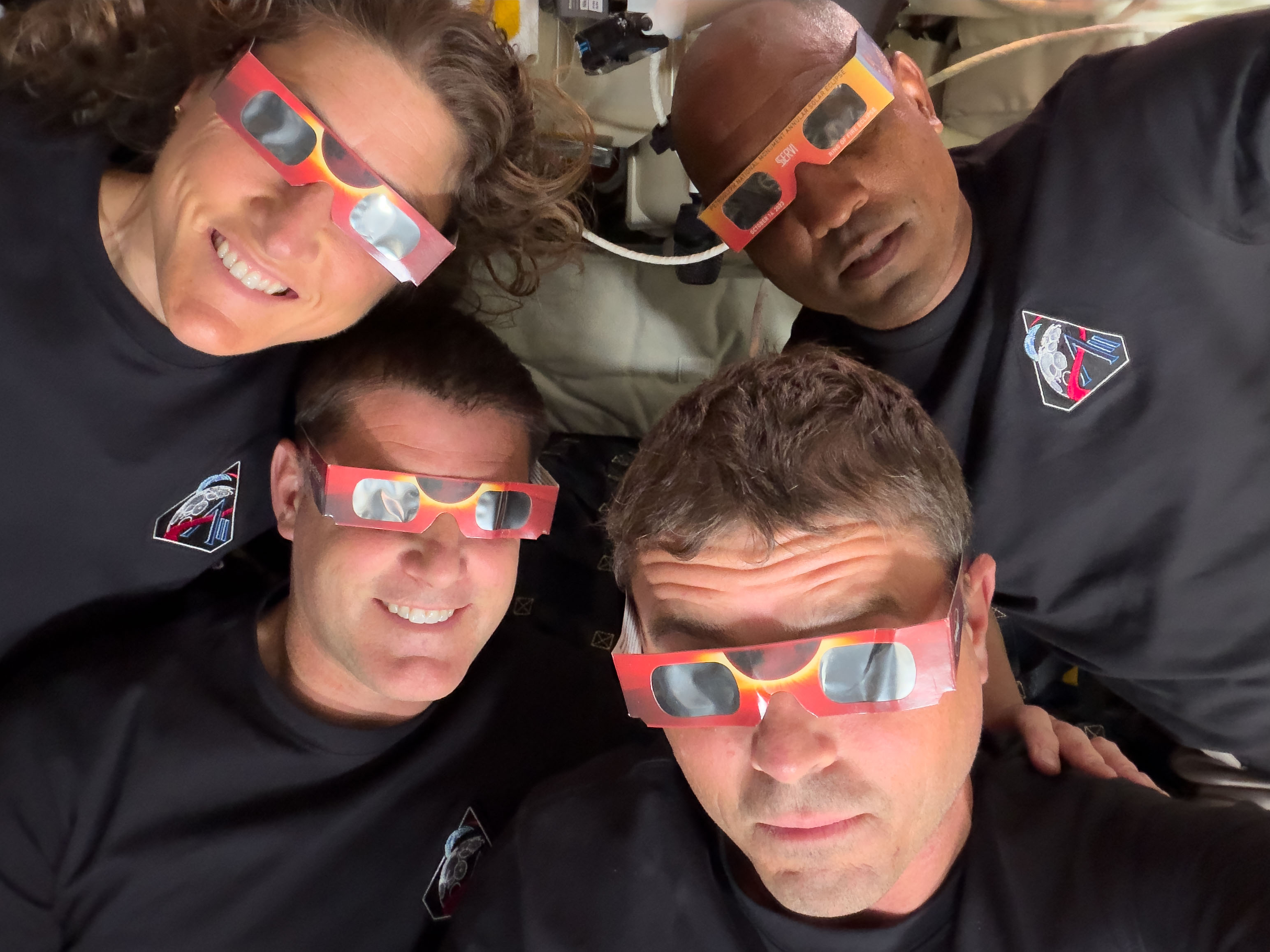 The Artemis II crew during their lunar flyby on April 6, 2026 — Mission Specialist Christina Koch, Mission Specialist Jeremy Hansen, Commander Reid Wiseman, and Pilot Victor Glover.