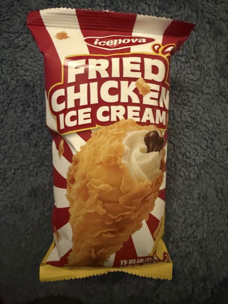 The Icenova Fried Chicken Ice Cream individual package with red and white striped wrapper