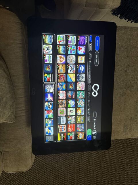 The Infinity Game Table game library showing available titles Game Selection UI