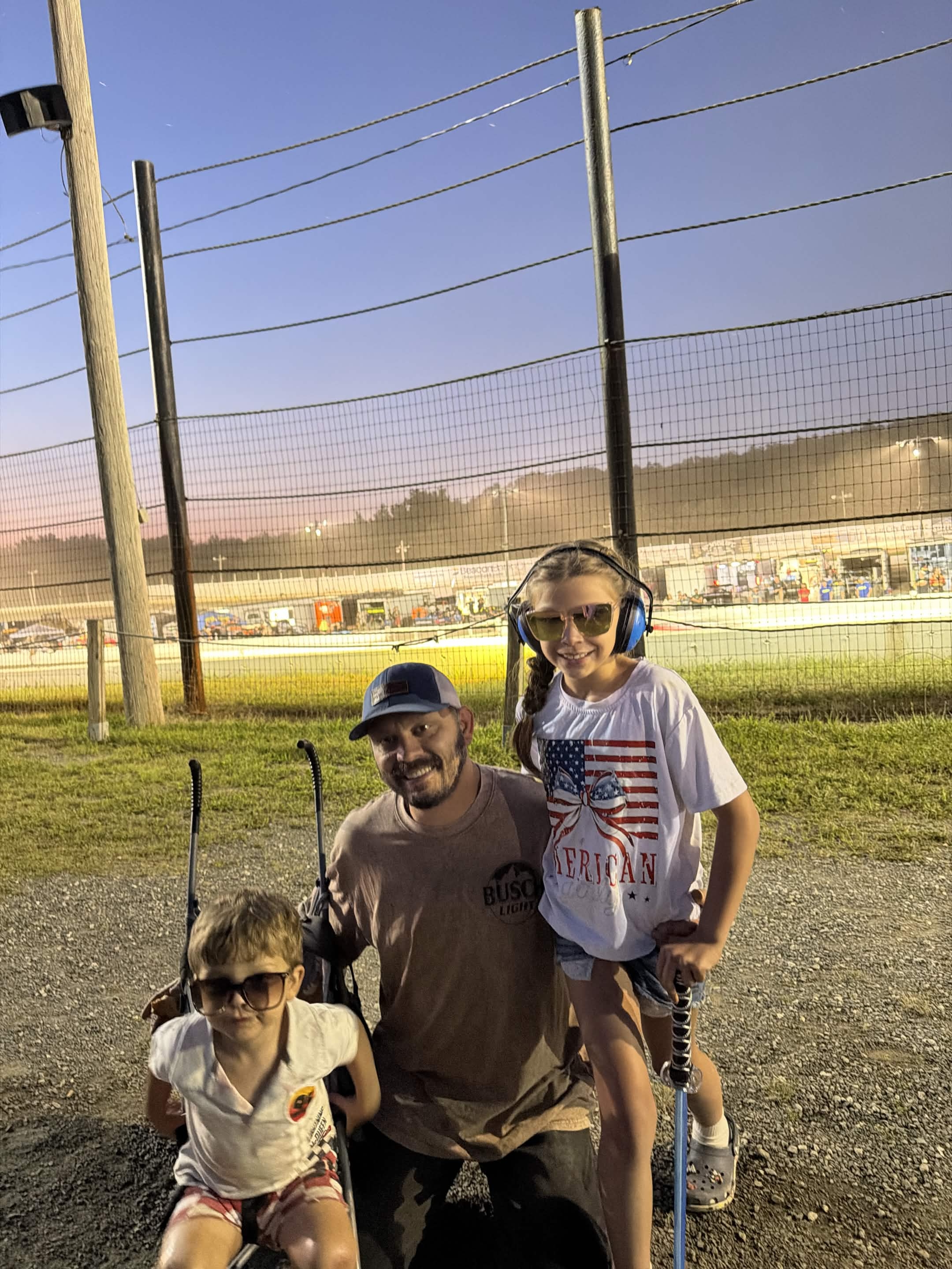 Race cars on the dirt track at Lebanon Valley Speedway under the lights